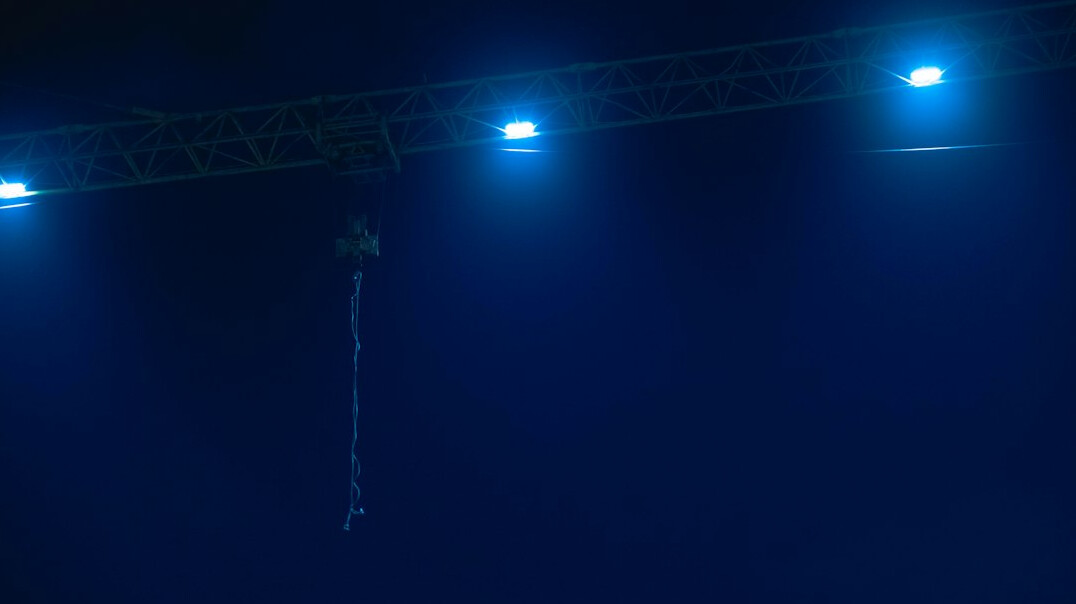 Live show stage with spotlights and camera crane